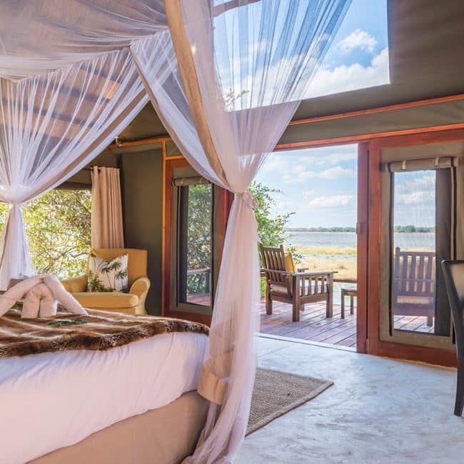 Deluxe Suites- bedroom overlooking deck